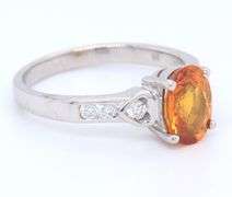 Charming White Gold Oval Yellow Orange Sapphire and Diamond Ring