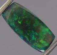 Outstanding 1.79ct full body flashing Black Opal