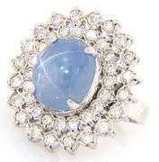 6.00ct Oval Star Sapphire Cabochon and 2.00ctw Diamond Starburst Frame Ring in 14K