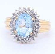 Gorgeous Yellow Gold Oval Aqumarine and Diamond Ring