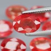 Uniquely colored 7.82ct Imperial red Sapphire set