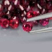 Premium diamond cut 7.77ct Rhodolite Garnet set