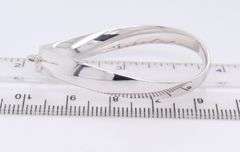 Handsome White Gold Twisted Oval Hoop Earrings