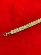 ITALIAN 18K YELLOW GOLD THREE ROW FLAT WHEAT LINK BRACELET.