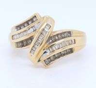 Beautiful Round Brilliant Cut and Baguette Diamond Ring in Yellow Gold