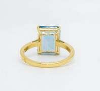 14KT YELLOW GOLD & 6.00 CARAT BLUE TOPAZ COCKTAIL RING