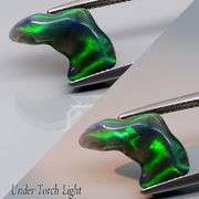 Dazzling 2.81ct free form black Opal vein