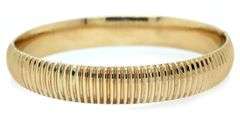 Polished Oval Striped Bangle Bracelet in 14K