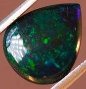 Magnificent 2.15ct blue and green flashing Black Opal
