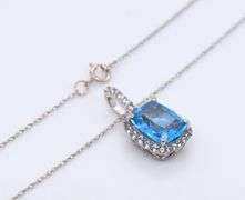 Dreamy White Gold Cushion Cut Blue Topaz and Diamond Pendant on Chain