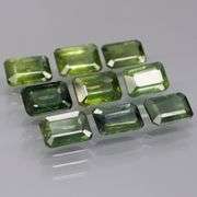 Heated only! 6.51ct emerald cut Sapphire set