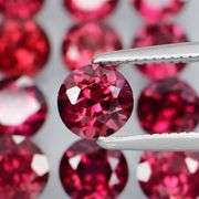 Premium solitaire cut 10.23ct VS Rhodolite Garnet set