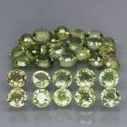 Fantastic 6.23ct diamond cut GREEN Sapphire set