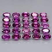 Ravishing 7.31ct violet pink Rhodolite Garnet set