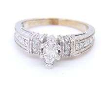Increbile White Gold approximate 0.50ctw Marquise and Round Diamond Bridal Set