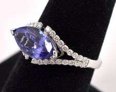 Elegant Tanzanite and Diamond Ring in 18K White Gold