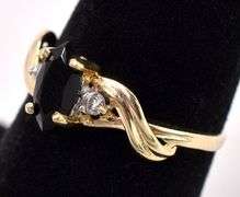 Extraordinary Black Gem and Diamond Ring In Yellow Gold