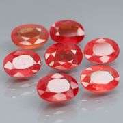 Uniquely colored 7.82ct Imperial red Sapphire set