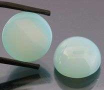Glowing 17.00ct blue Chalcedony cabochon pair