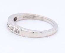 Dazzling White Gold Princess Cut Channel Set Diamond Band