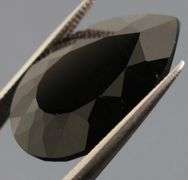 Elegant 10.22ct silky black Laos Tektite