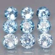 Superb quality 9.56ct 9 pc sky blue Topaz solitaire set