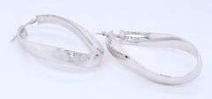 Handsome White Gold Twisted Oval Hoop Earrings