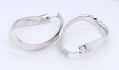 Handsome White Gold Twisted Oval Hoop Earrings