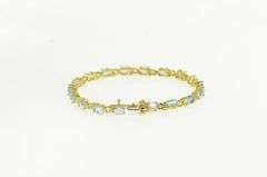 14K Yellow Gold Oval Blue Topaz Flower Blossom Tennis Bracelet