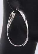 Handsome White Gold Twisted Oval Hoop Earrings