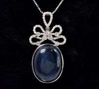 Enchanting Natural Blue Star Sapphire and Diamond Pendant Necklace in White Gold
