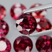 Premium solitaire cut 7.92ct VS Rhodolite Garnet set