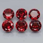 Fantastic 6.06ct round cut cherry red Garnet set