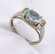 Sweet 14k WG Blue Topaz Ring