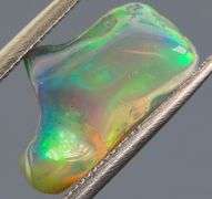 High fire collectors 2ct free form black Opal vein