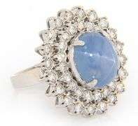 6.00ct Oval Star Sapphire Cabochon and 2.00ctw Diamond Starburst Frame Ring in 14K