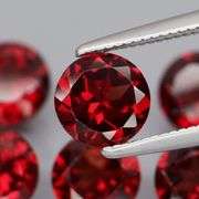 Fantastic 6.06ct round cut cherry red Garnet set