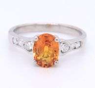 Charming White Gold Oval Yellow Orange Sapphire and Diamond Ring