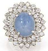 6.00ct Oval Star Sapphire Cabochon and 2.00ctw Diamond Starburst Frame Ring in 14K
