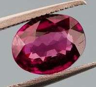Glittering 1.38ct untreated top violet pink Rhodolite Garnet