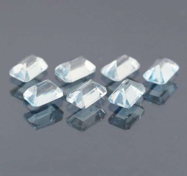 Large 5.40ct platinum blue emerald cut Topaz set