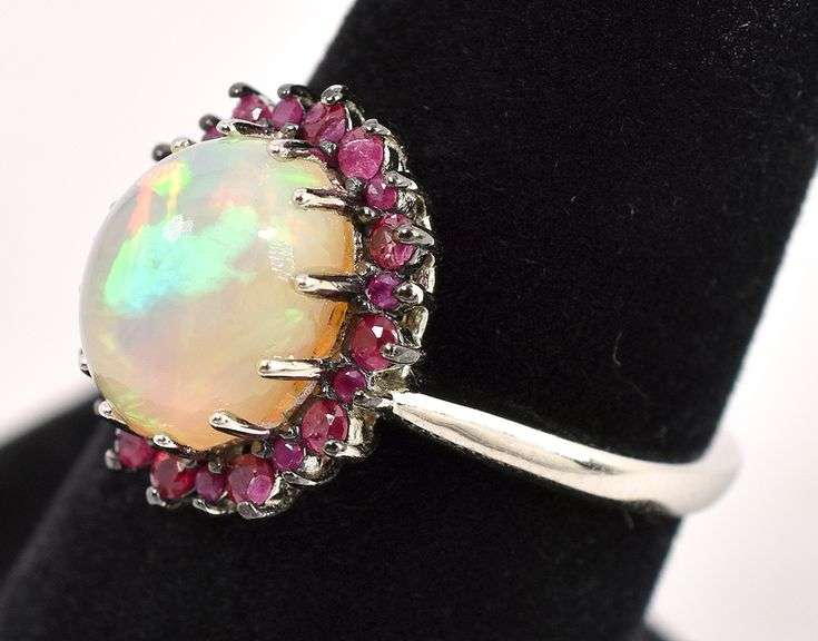 Lovely 3.42CTS Opal & 0.62CTW Ruby Ring in Sterling Silver