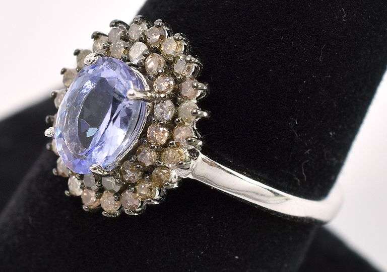 Elegant 1.2CTS Oval Cut Tanzanite & 0.60CTW Diamond Ring in Sterling Silver