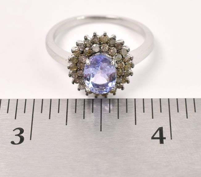 Elegant 1.2CTS Oval Cut Tanzanite & 0.60CTW Diamond Ring in Sterling Silver