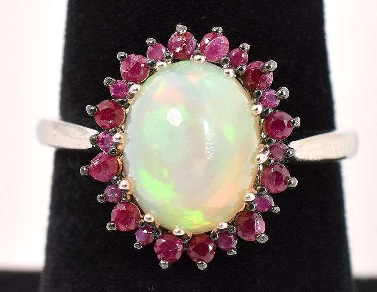 Lovely 3.42CTS Opal & 0.62CTW Ruby Ring in Sterling Silver