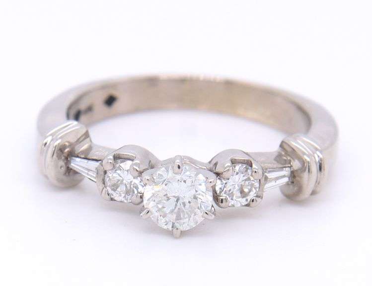 Dazzling White Gold Round Brilliant Cut and Tapered Baguette Three Stone Diamond Ring