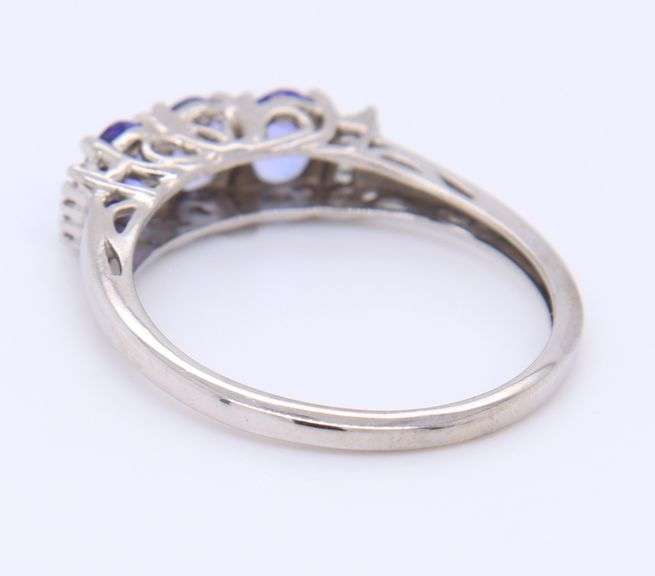 Gorgeous White Gold Oval Tanzanite and Baguette Three Stone Ring