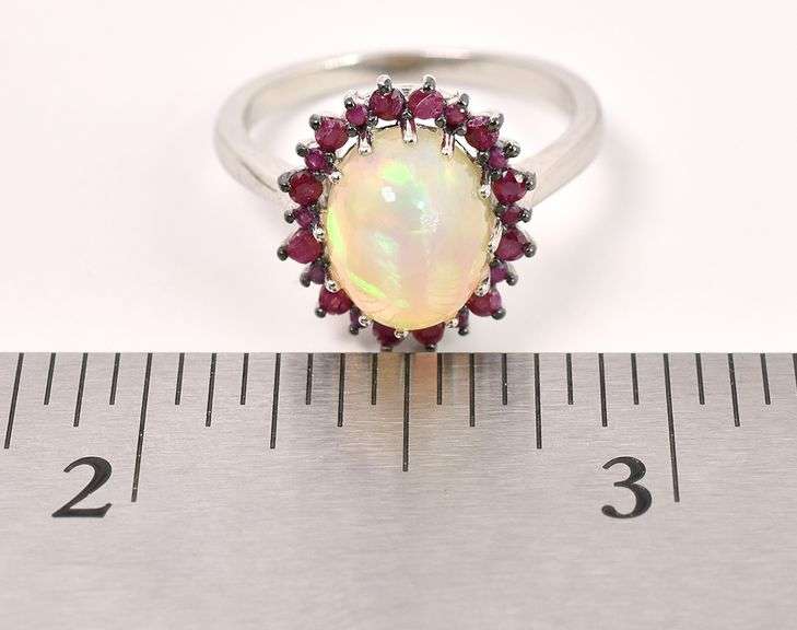 Lovely 3.42CTS Opal & 0.62CTW Ruby Ring in Sterling Silver