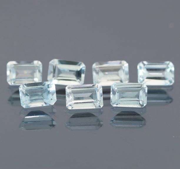 Large 5.40ct platinum blue emerald cut Topaz set