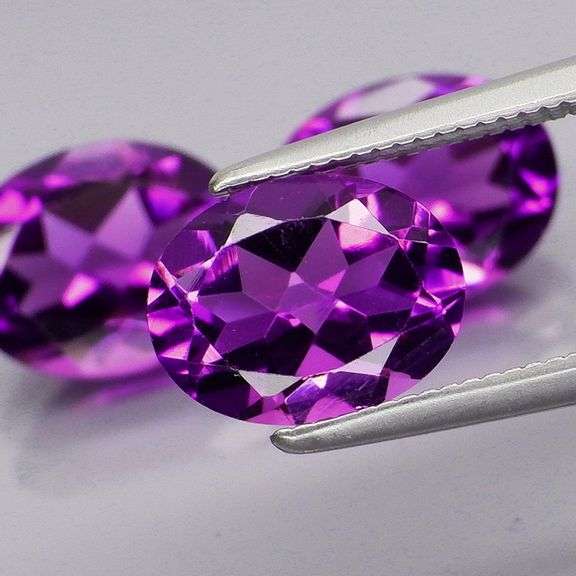 Glittering 5.19ct 9x7mm real Bolivian Amethyst set